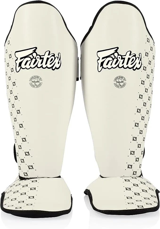 Fairtex SP5 Muay Thai Shin Guards for Men, Women, Kids | Shinguards are Premium, Lightweight & Durable | Extended Protection to Avoid shin splints During Training or Sparring - Small,BlackFairtex SP5 Muay Thai Shin Guards for Men, Women, Kid…